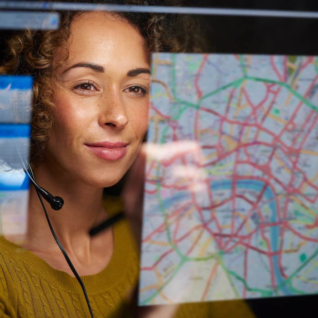 Operations professional reviewing a city dispatch map overlay
